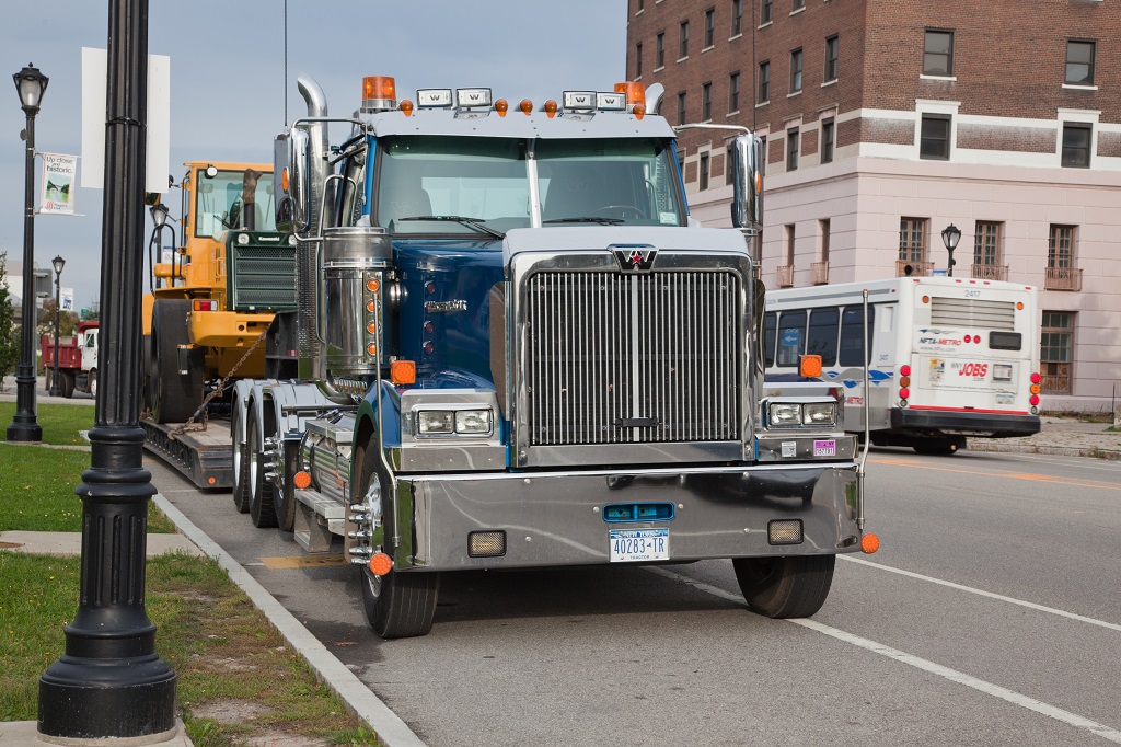 What is a lowboy trailer used for