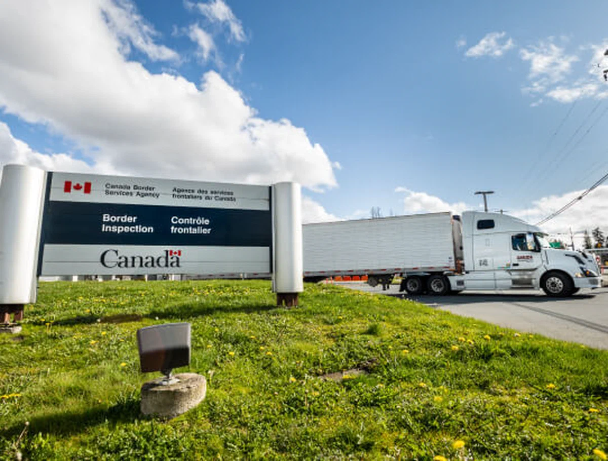 Freight truck on a bridge.